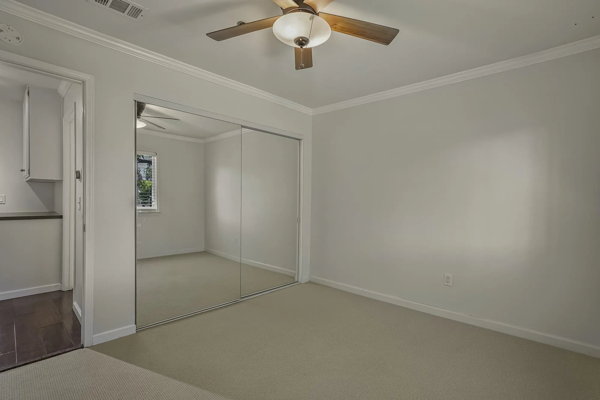 139 Mangano Circle Encinitas, CA 92024 - Photo 14 of 18 an empty room with a chandelier fan