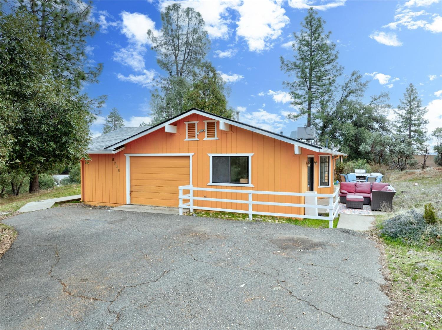 5785 Glacier Point Mariposa, CA 95338 - Photo 5 of 38 a view of a house with a yard and sitting area