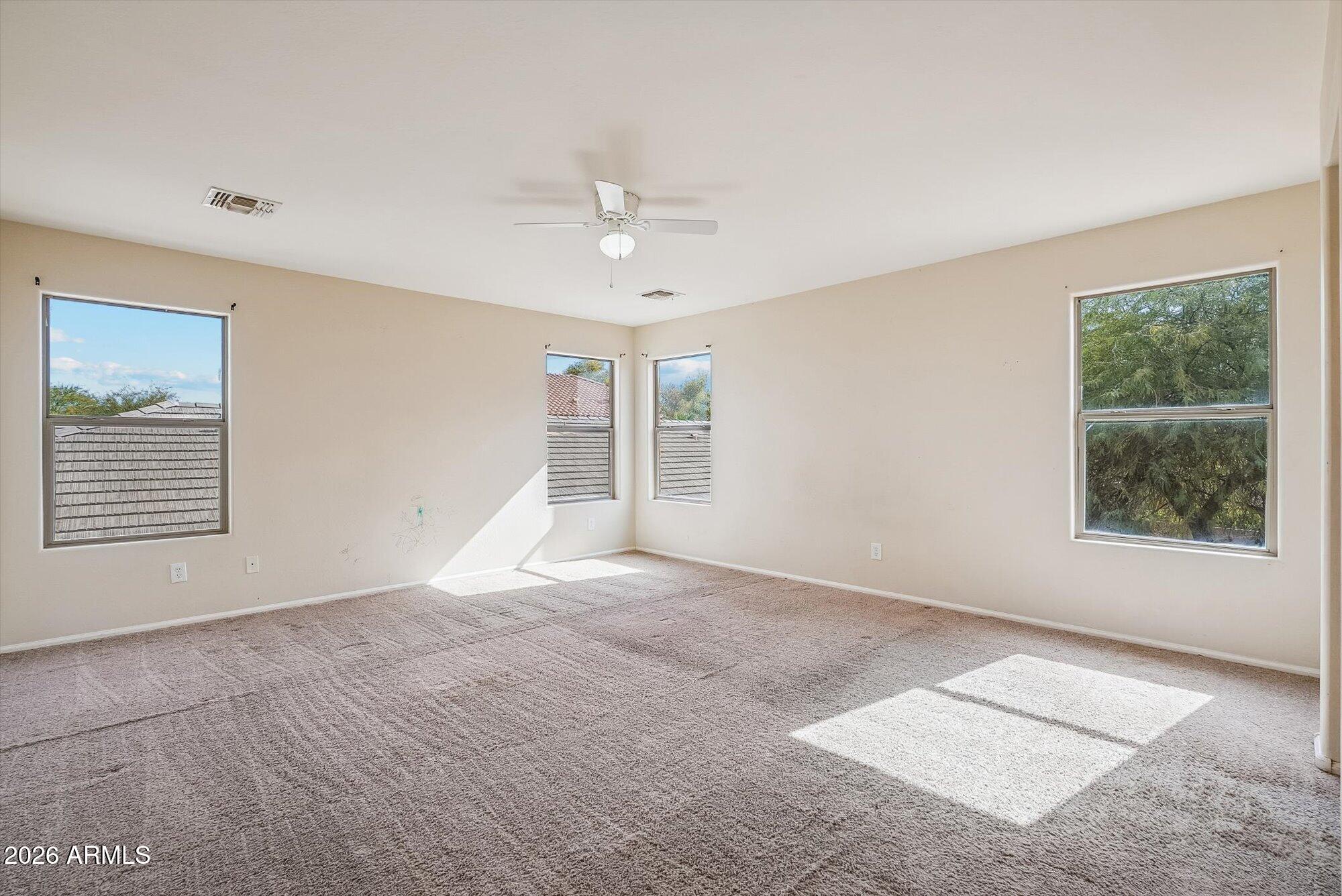 3903 East Citrine Road San Tan Valley, AZ 85143 - Photo 14 of 34 a view of an empty room with a window