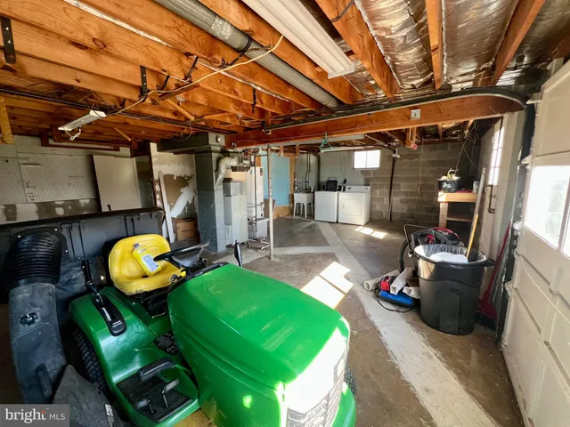 a view of an empty room with a fireplace