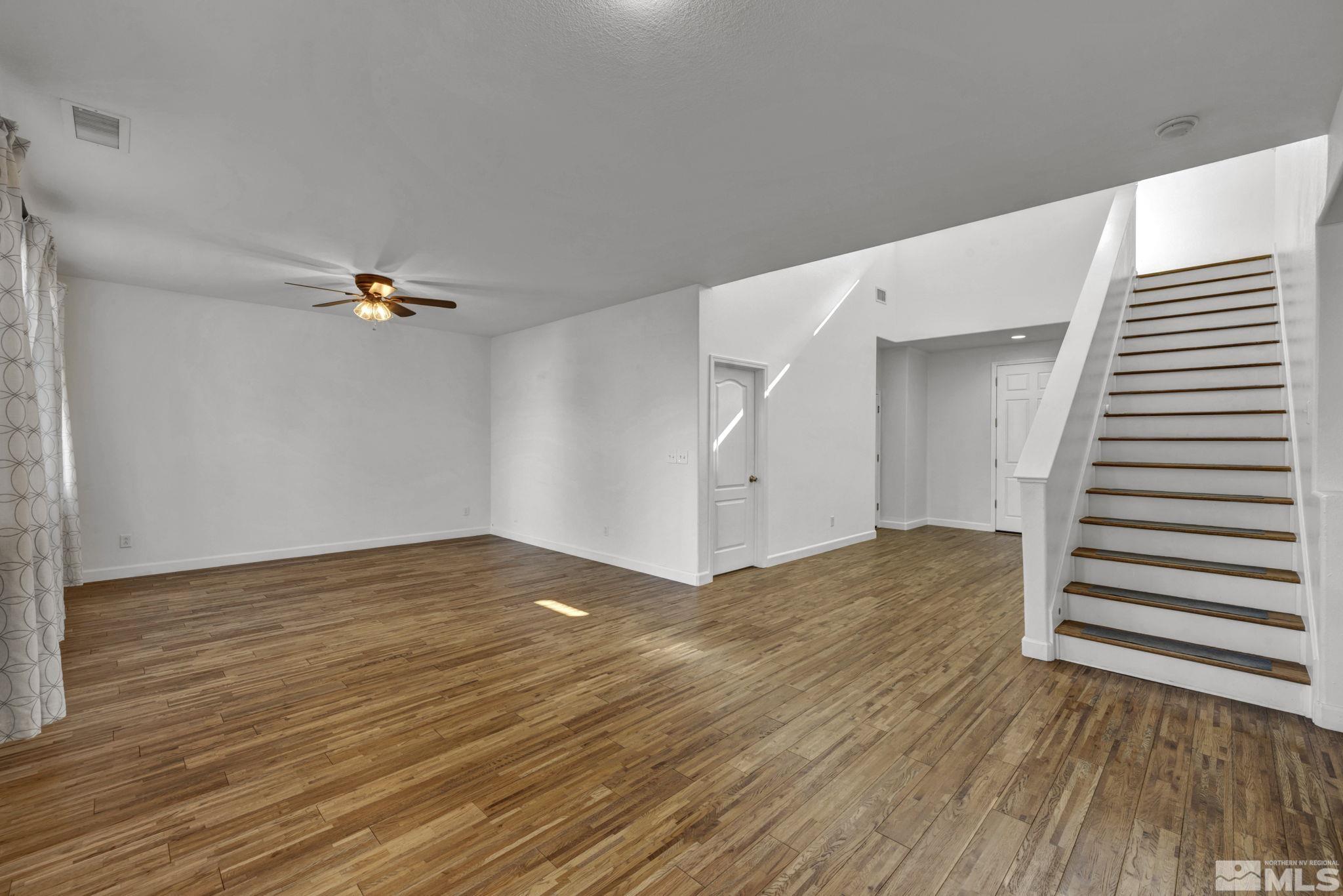 11275 Torino Way Reno, NV 89521 - Photo 27 of 37 a view of a livingroom with wooden floor