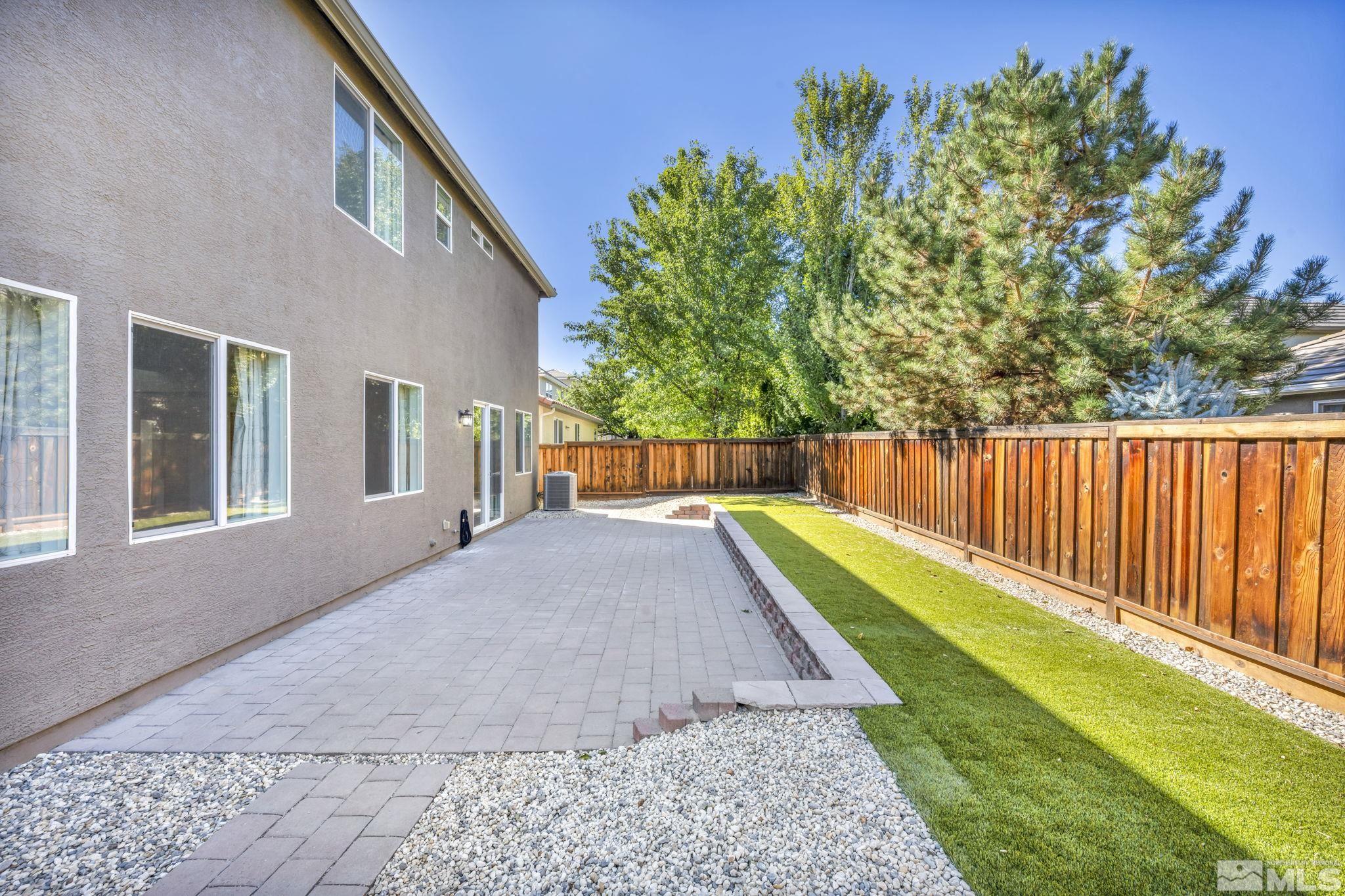 11275 Torino Way Reno, NV 89521 - Photo 3 of 37 a view of backyard with green space