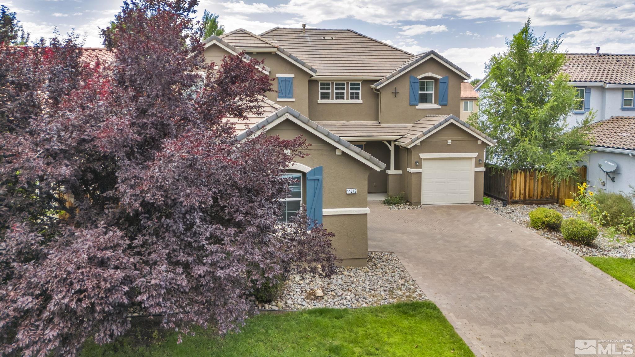 11275 Torino Way Reno, NV 89521 - Photo 36 of 37 a front view of a house with garden
