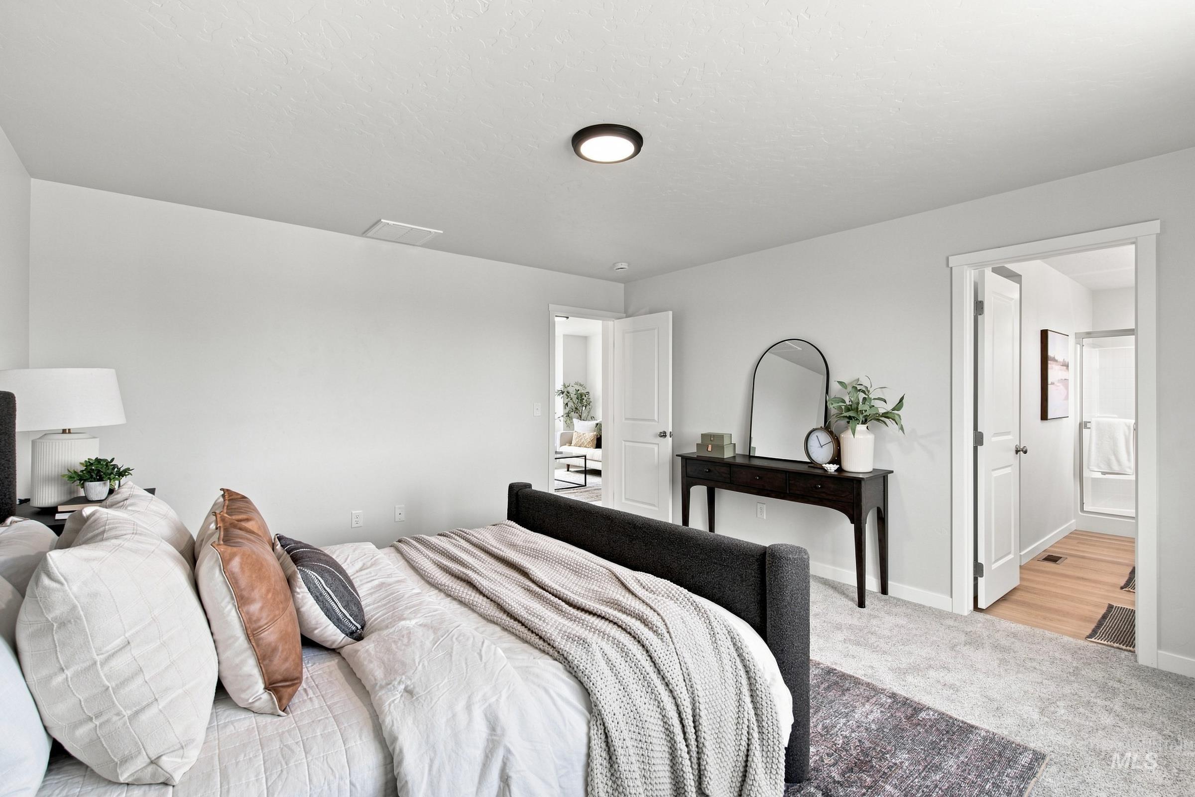 14044 Shiny Spruce Street Caldwell, ID 83607 - Photo 31 of 37 Recessed lighting, carpeted flooring, and a private attached bathroom with wood-finish flooring