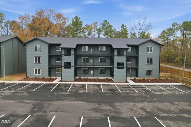 a front view of a building with street view