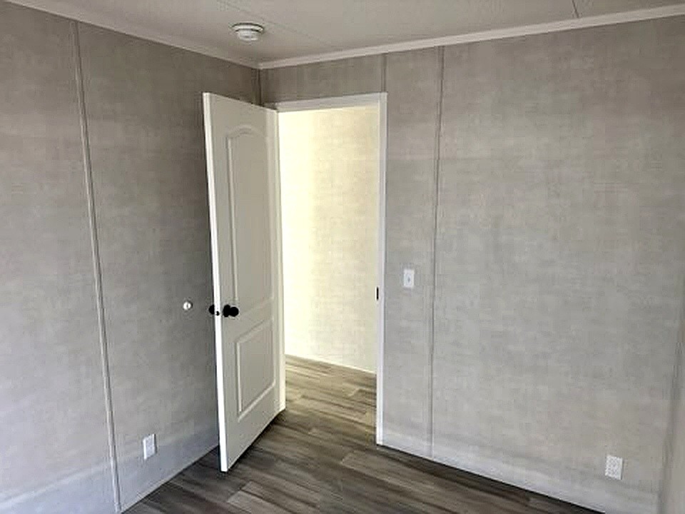 295 Cotham Drive Huntingdon, TN 38344 - Photo 13 of 19 a bathroom with a shower and a glass door