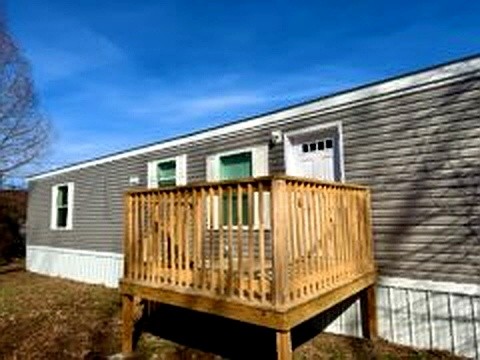 295 Cotham Drive Huntingdon, TN 38344 - Photo 2 of 19 a front view of a house with a balcony