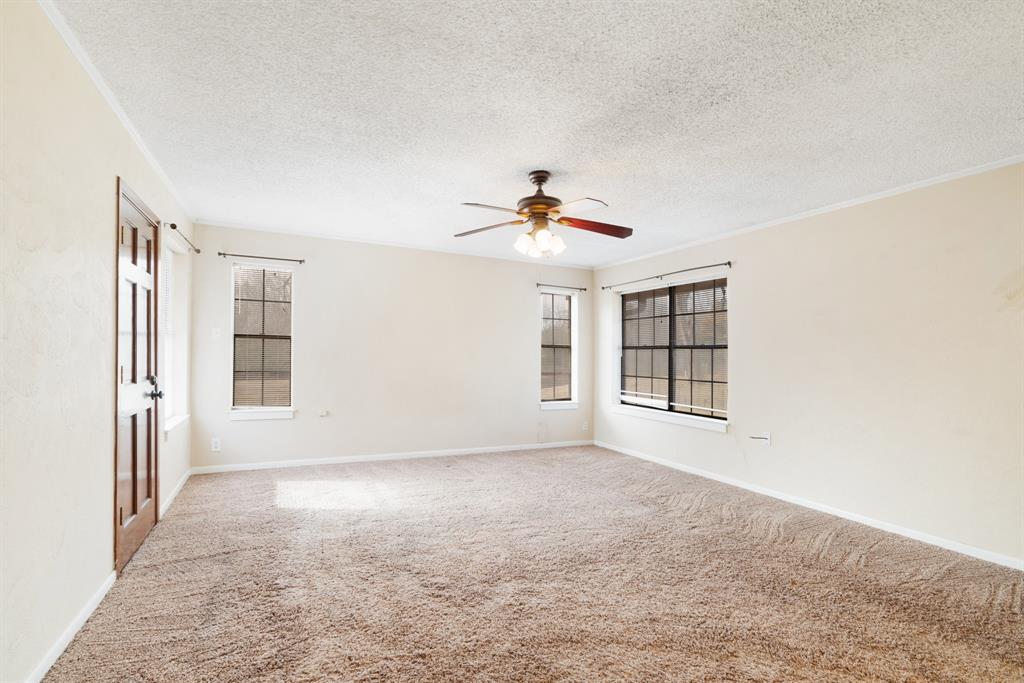 595 County Road Powderly, TX 75473 - Photo 7 of 25 a view of an empty room with a window