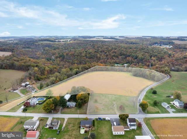 an aerial view of lake and residential houses