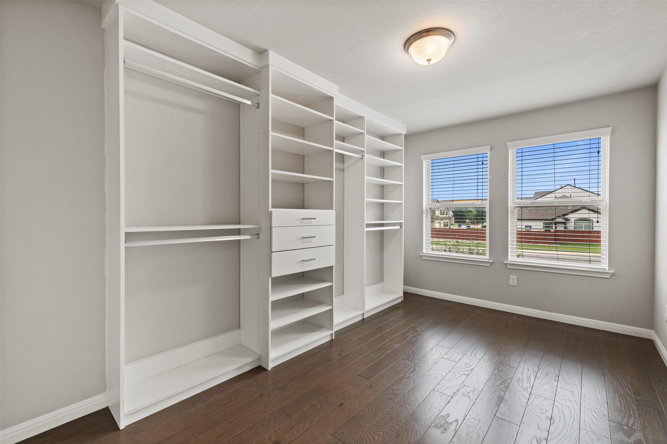 1615 Airedale Road Austin, TX 78748 - Photo 22 of 39 a view of wooden floor and windows in a room