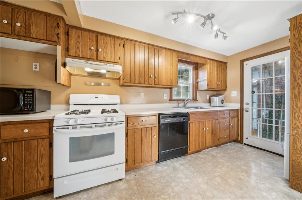 552 Hampton Street Greensburg, PA 15601 - Photo 17 of 36 a kitchen with a stove oven and sink