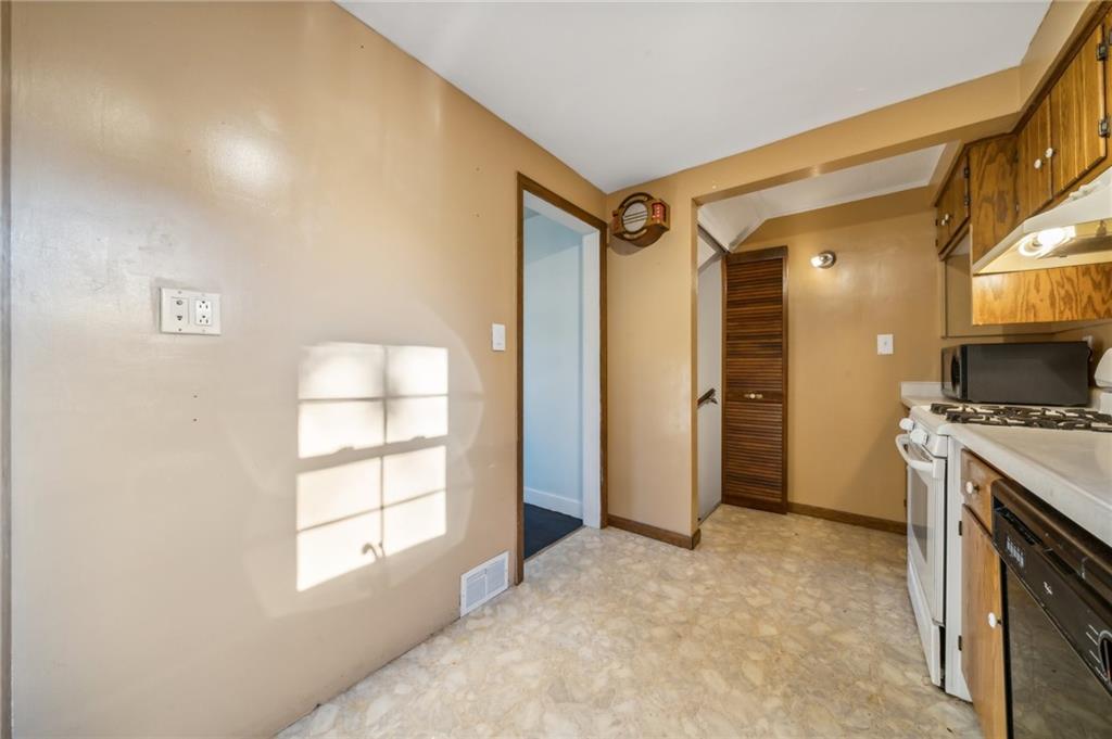 552 Hampton Street Greensburg, PA 15601 - Photo 18 of 36 a view of a kitchen with a sink and a window