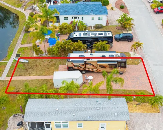a view of a street with potted plants
