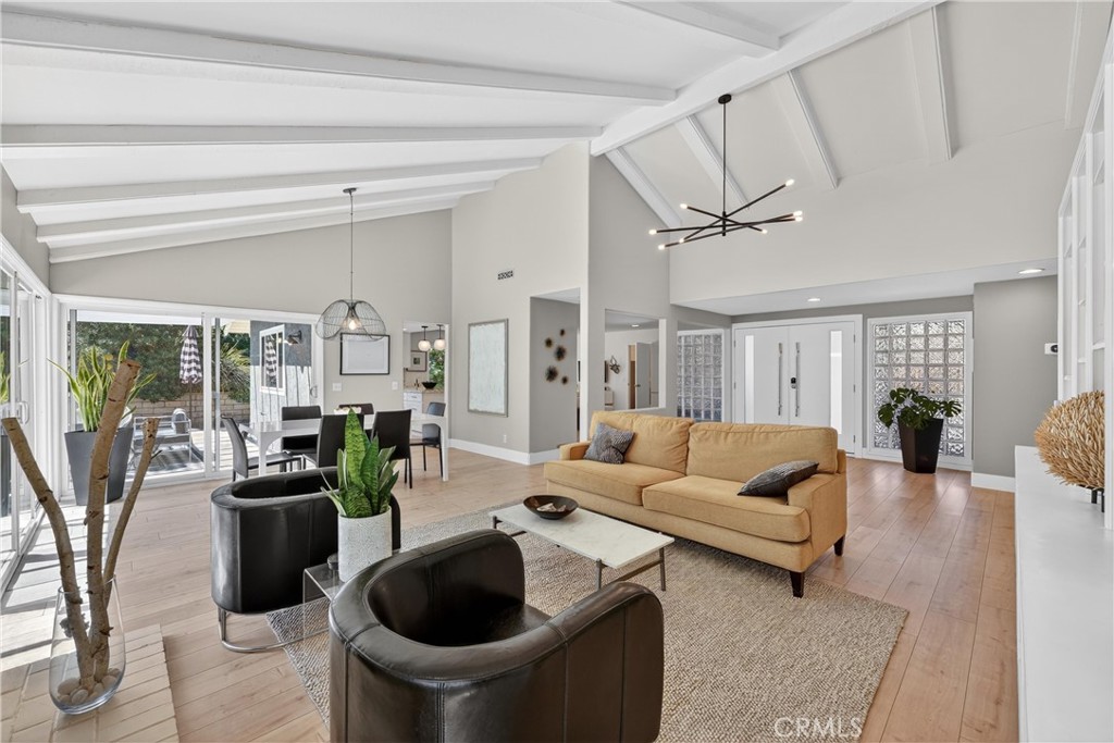 945 Le Conte Drive Riverside, CA 92507 - Photo 1 of 36 The living room is surrounded by windows. The vaulted ceiling feels great!