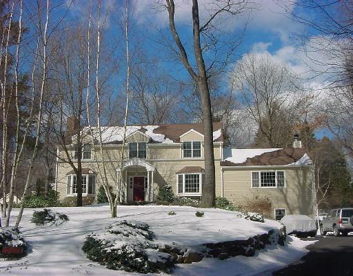 189 Old Boston Road Wilton, CT 06897 - Photo 1 of 1 a front view of a house with a yard