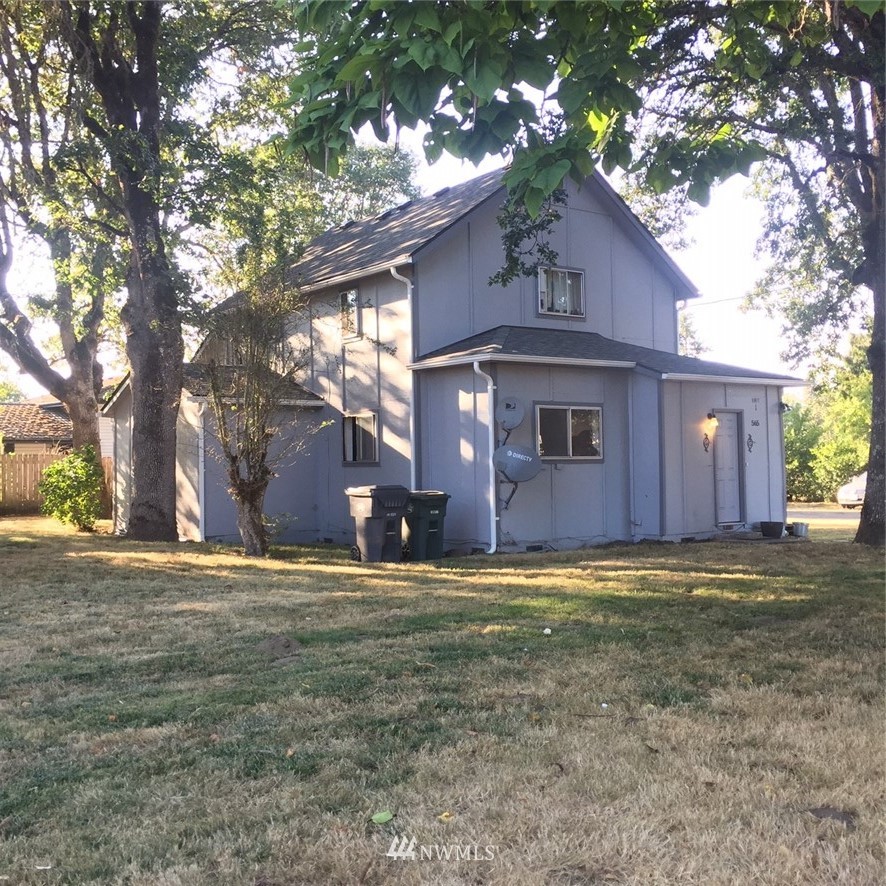 a big house with lots of trees