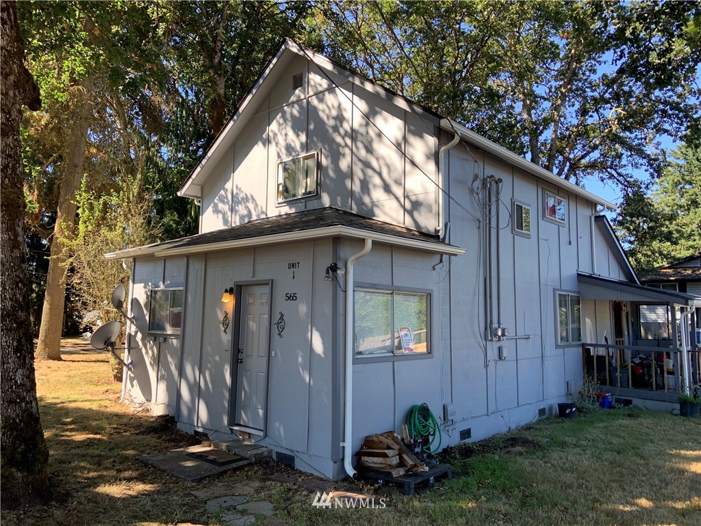 565 McNaught Road South, Unit 1&2 Roy, WA 98580 - Photo 2 of 14 a view of back yard of the house
