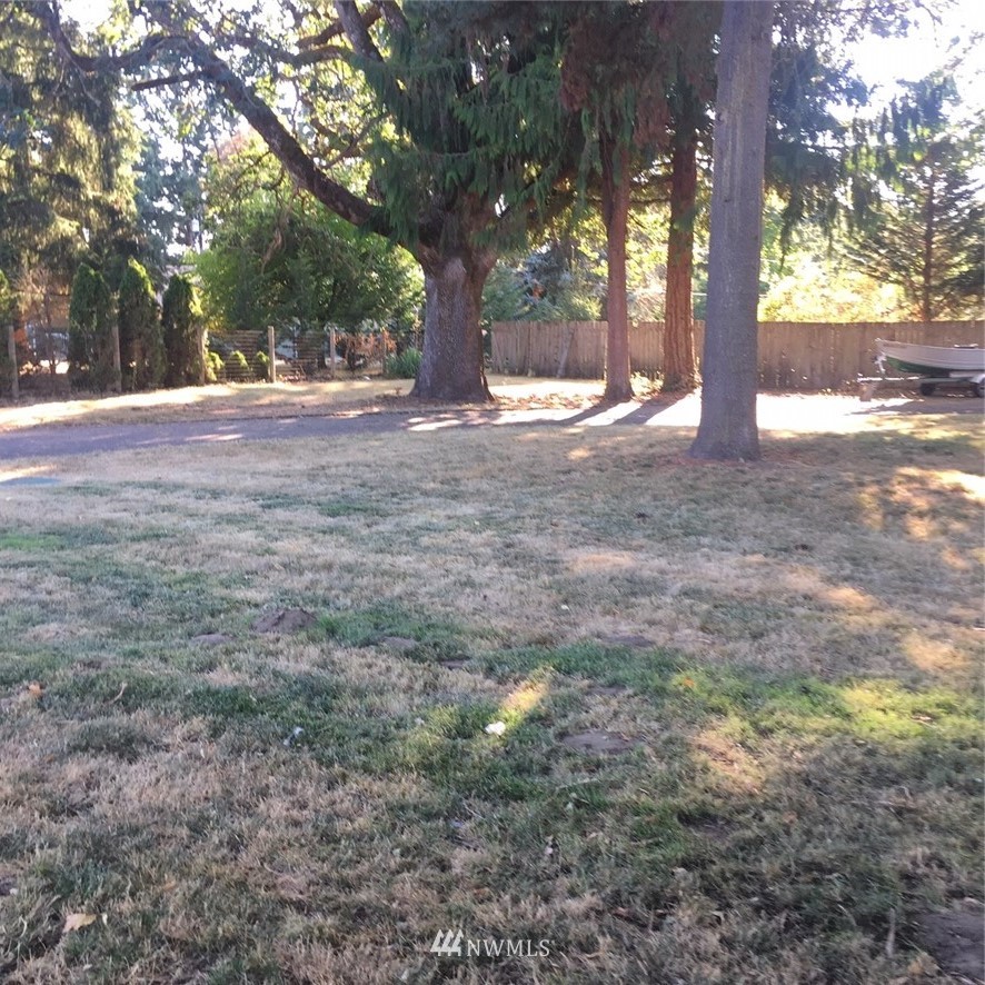 565 McNaught Road South, Unit 1&2 Roy, WA 98580 - Photo 4 of 14 a view of outdoor space with trees