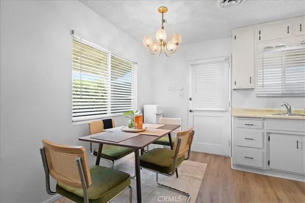 a bedroom with a bed and a desk