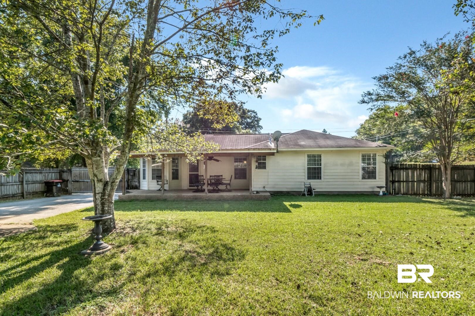 1345 Camden Court Mobile, AL 36695 - Photo 26 of 31 Back of property with a fenced backyard, a patio, and ceiling fan