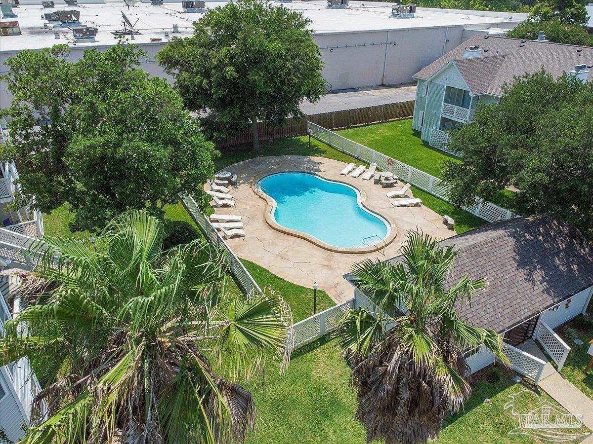 601 East Burgess Road, Unit C3 Pensacola, FL 32504 - Photo 31 of 35 an aerial view of a house with swimming pool and porch