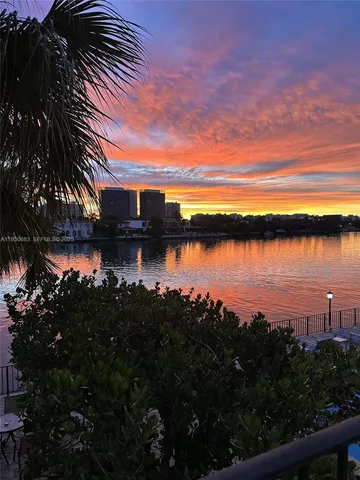 a view of a street next to a yard