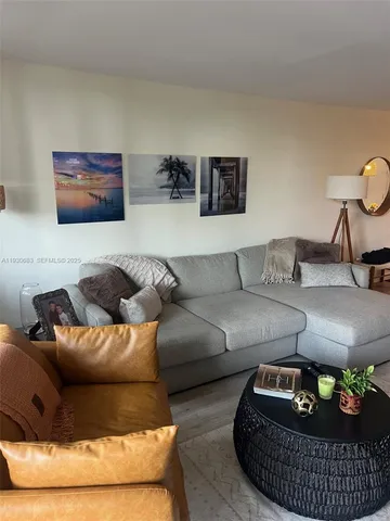a living room with furniture and a couch