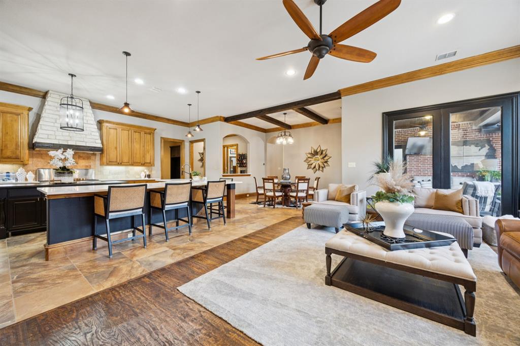 4290 Castle Bank Lane Frisco, TX 75033 - Photo 13 of 40 a living room with lots of furniture and kitchen view