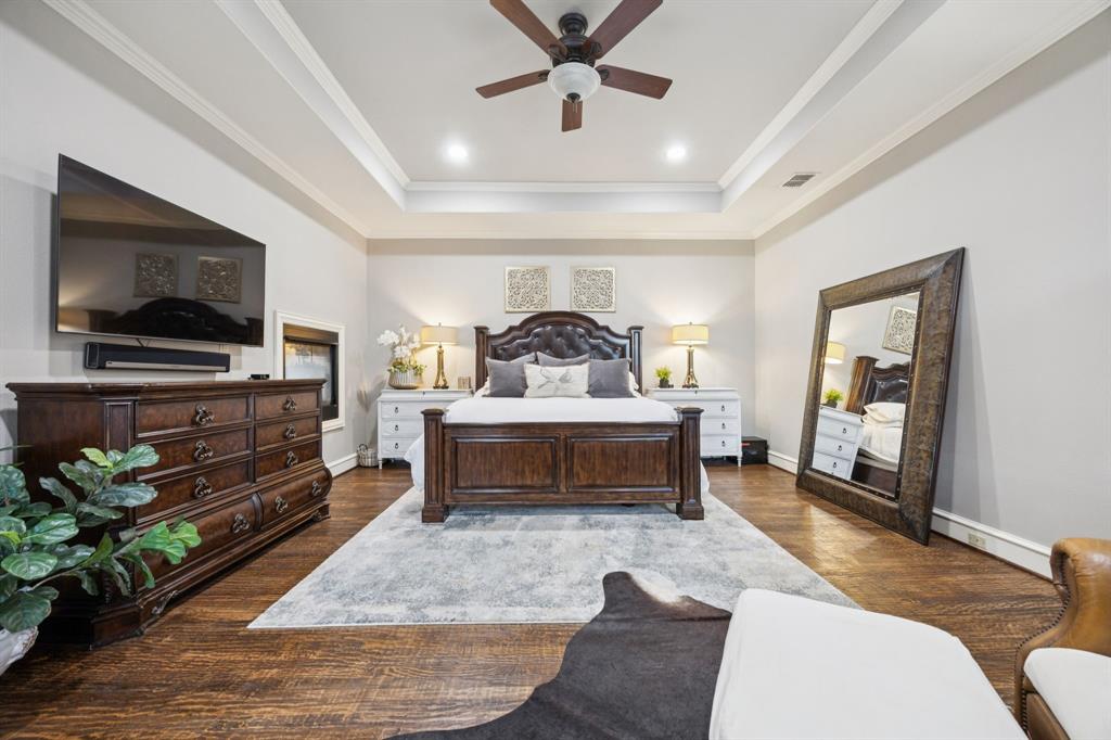 4290 Castle Bank Lane Frisco, TX 75033 - Photo 18 of 40 a living room with furniture and a flat screen tv