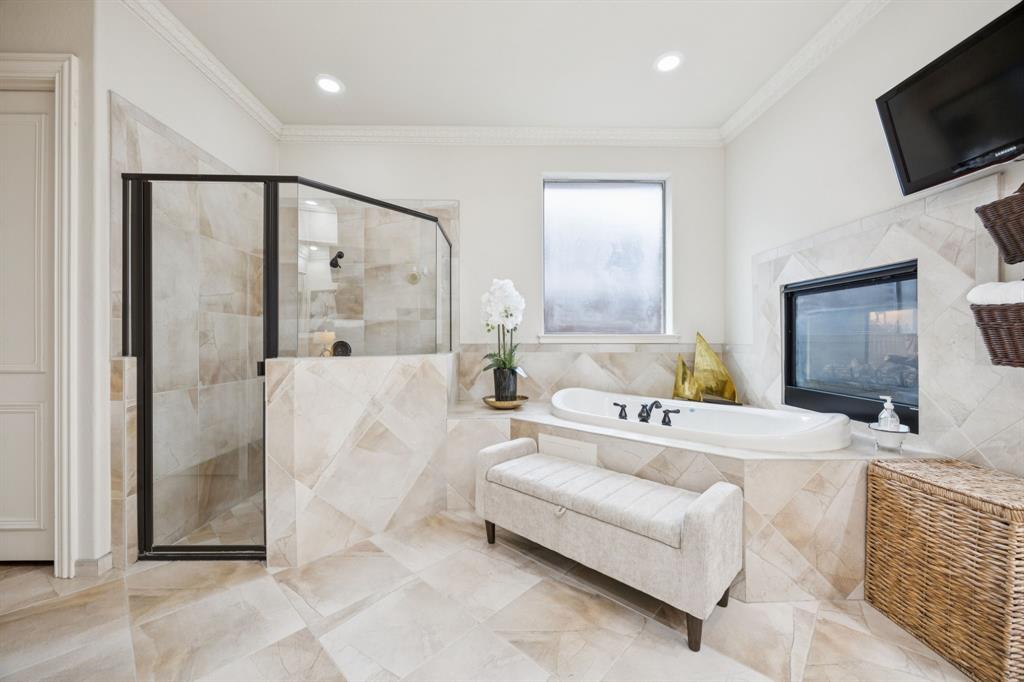 4290 Castle Bank Lane Frisco, TX 75033 - Photo 22 of 40 a living room with furniture and a flat screen tv