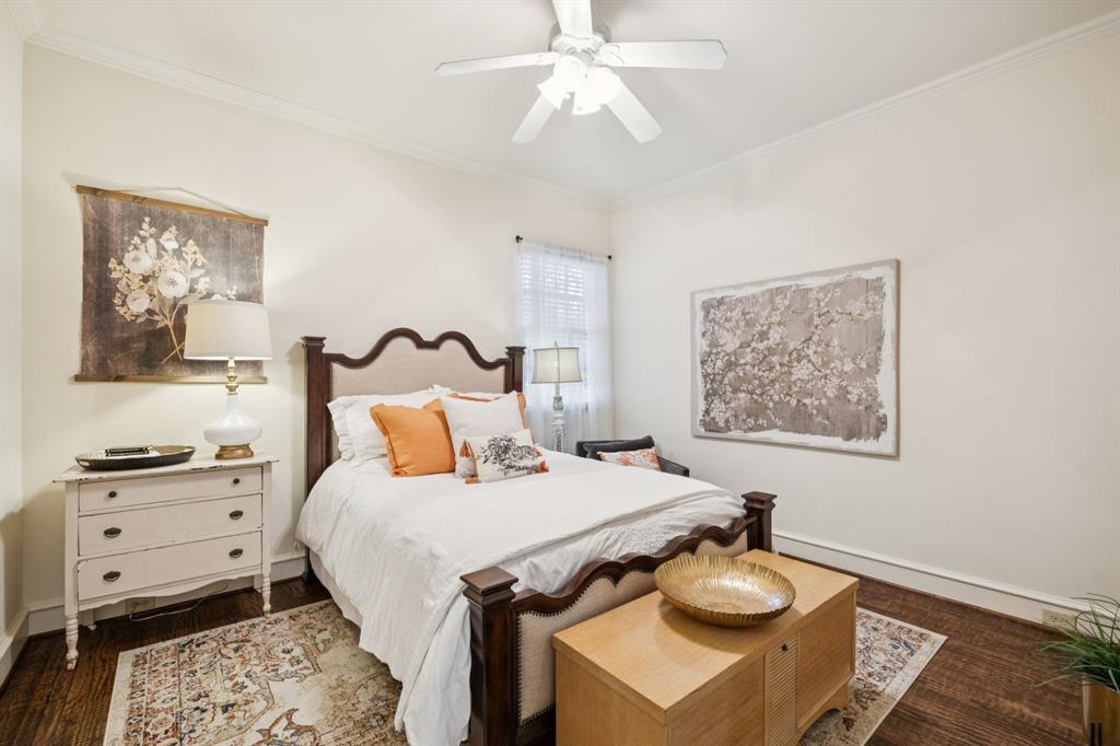 4290 Castle Bank Lane Frisco, TX 75033 - Photo 23 of 40 a bedroom with a bed and cabinets