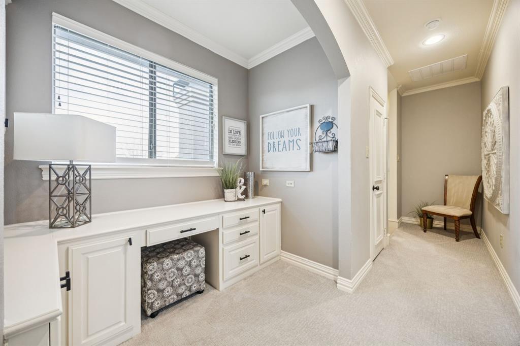 4290 Castle Bank Lane Frisco, TX 75033 - Photo 33 of 40 a spacious bathroom with a double vanity sink a mirror and a bathtub