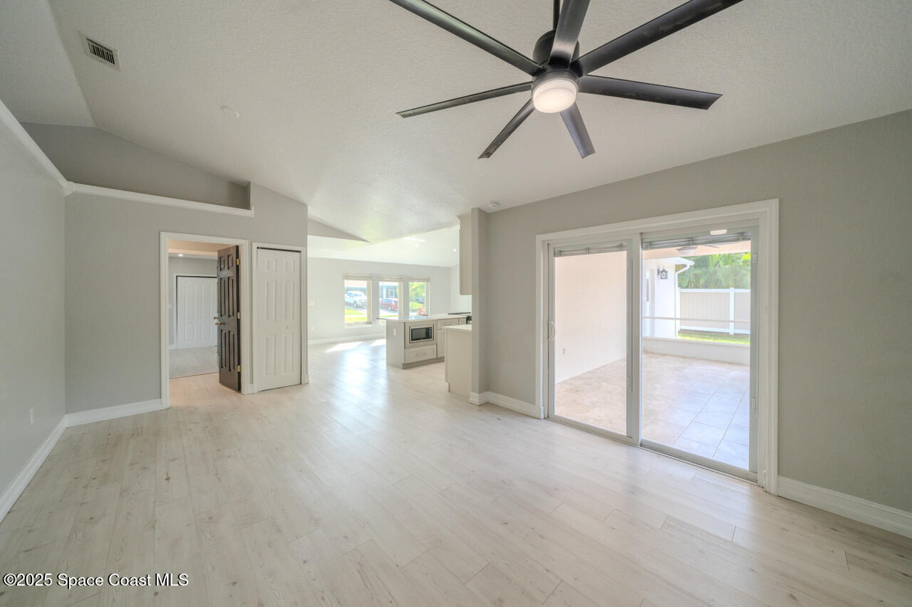 490 Tillman Avenue Southwest Palm Bay, FL 32908 - Photo 13 of 38 a view of a big room with closet and windows