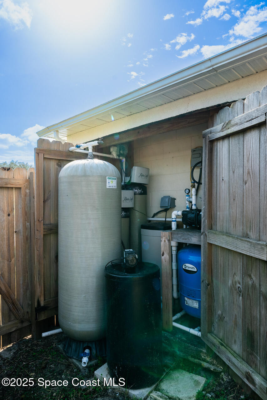 490 Tillman Avenue Southwest Palm Bay, FL 32908 - Photo 37 of 38 a close view of water heater room