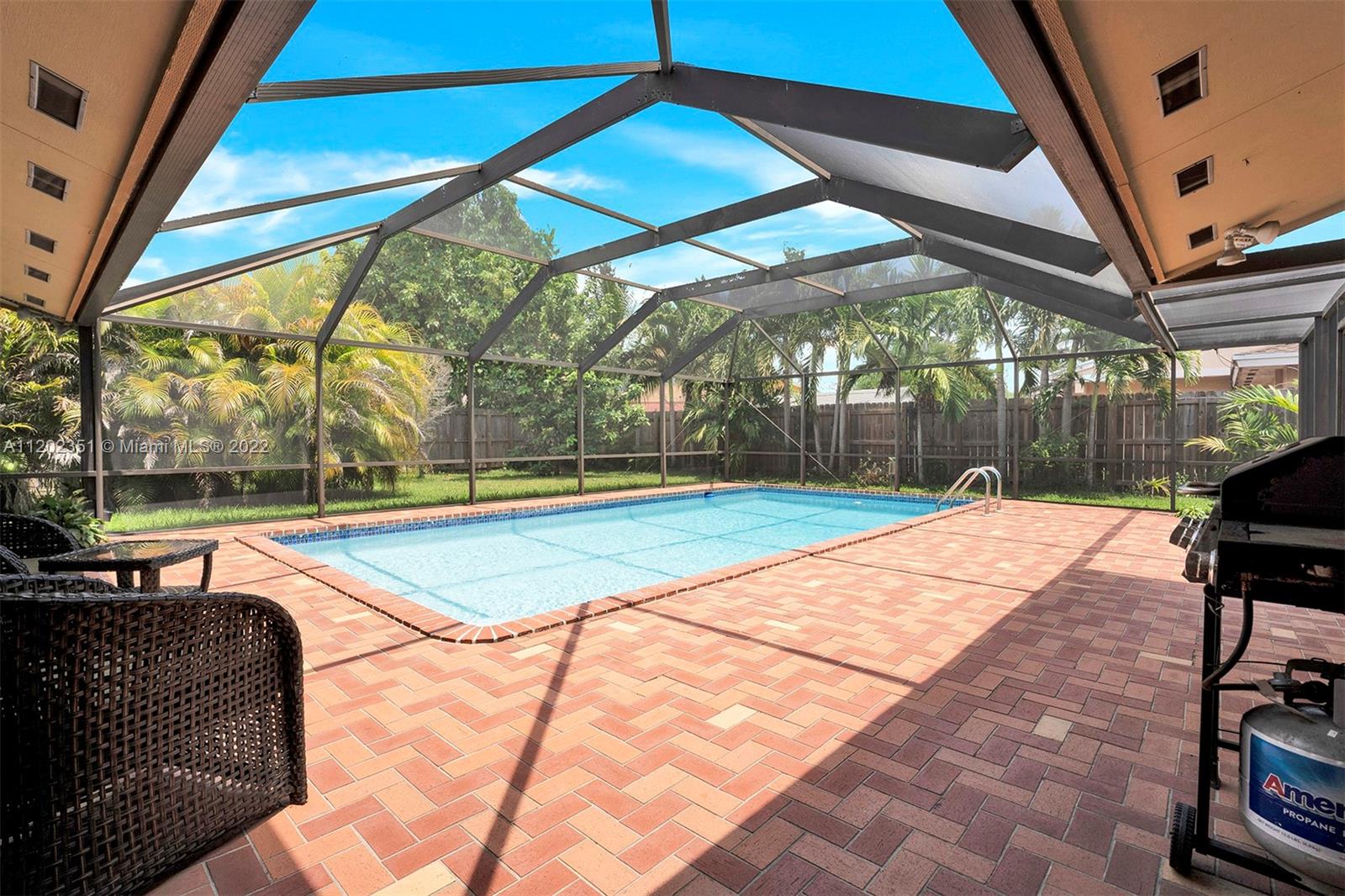 12801 Southwest 148th Street Road Miami, FL 33186 - Photo 29 of 39 a view of swimming pool with seating area