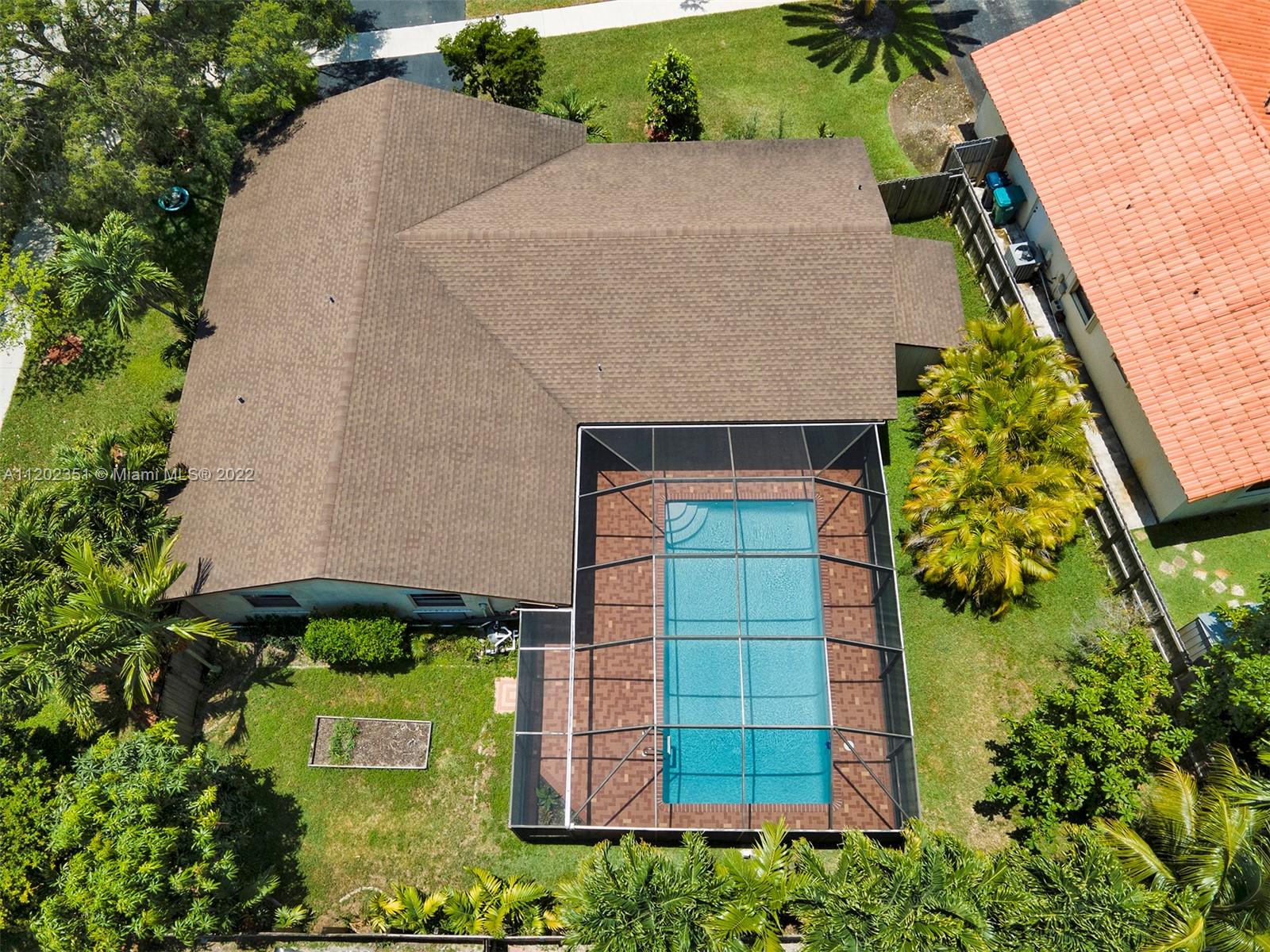 12801 Southwest 148th Street Road Miami, FL 33186 - Photo 37 of 39 an aerial view of a house