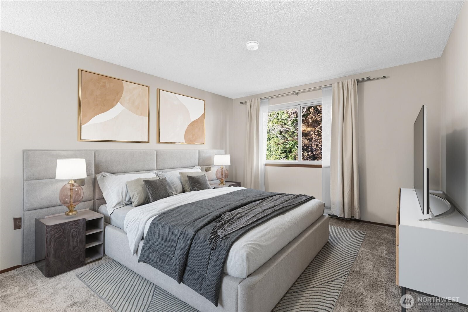 15914 3rd Place Southwest, Unit C Burien, WA 98166 - Photo 14 of 34 a bedroom with a large bed and a window