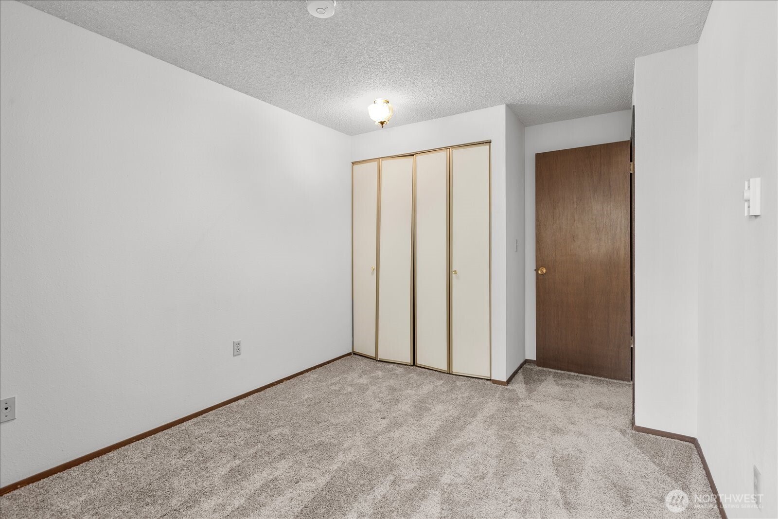 15914 3rd Place Southwest, Unit C Burien, WA 98166 - Photo 25 of 34 a view of an empty room