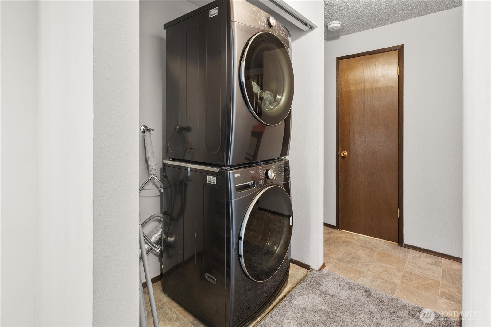 15914 3rd Place Southwest, Unit C Burien, WA 98166 - Photo 26 of 34 a utility room with dryer and washer