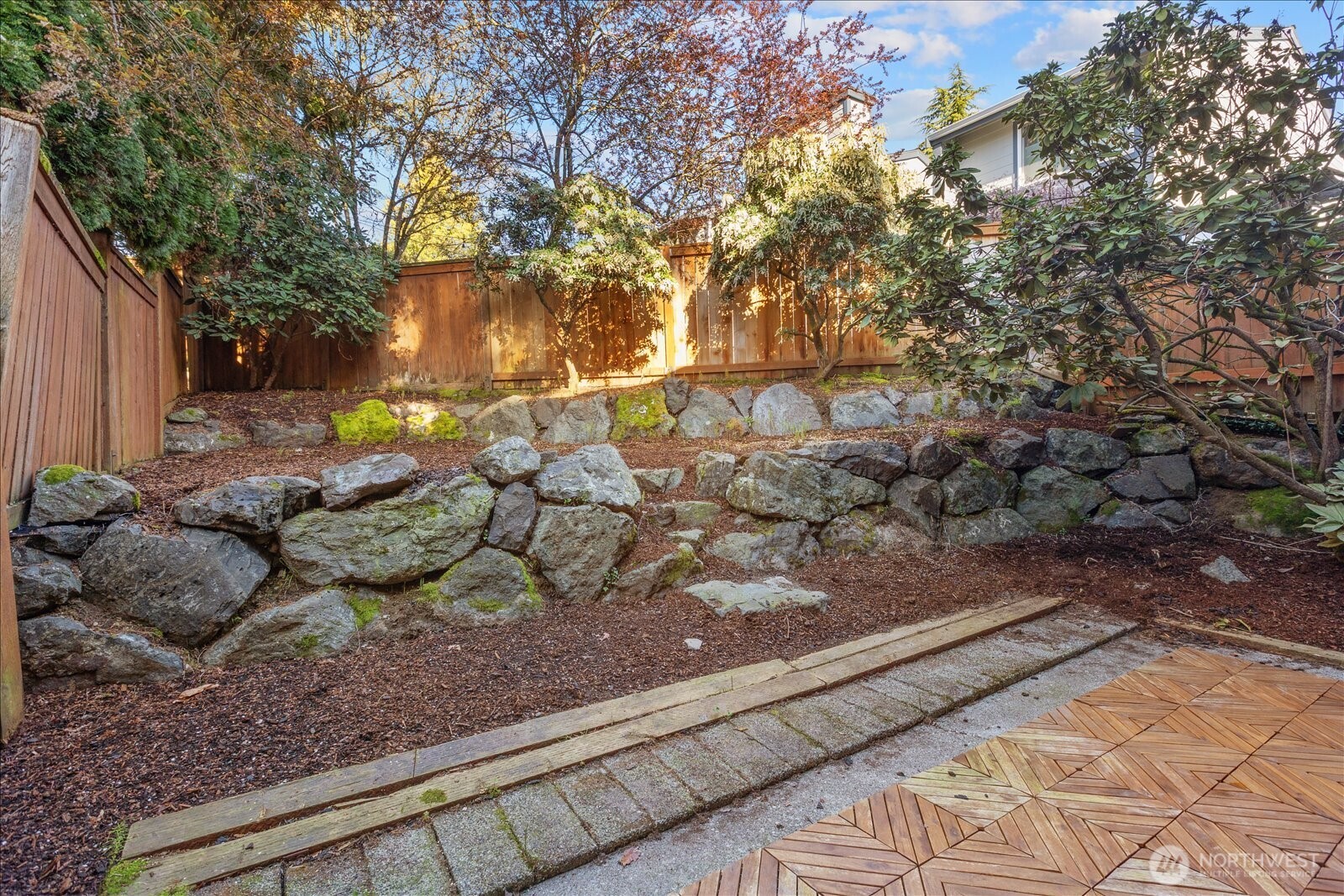 15914 3rd Place Southwest, Unit C Burien, WA 98166 - Photo 30 of 34 a view of a tree with a yard