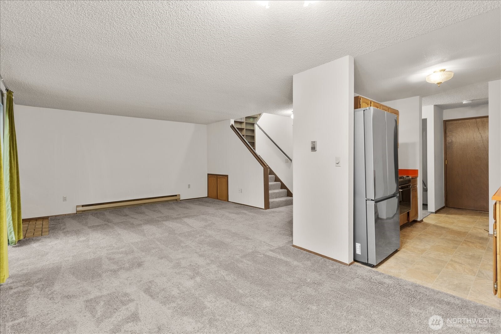 15914 3rd Place Southwest, Unit C Burien, WA 98166 - Photo 6 of 34 a view of an empty room with a window