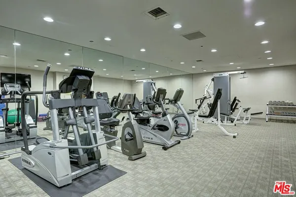 a view of a room with gym equipment