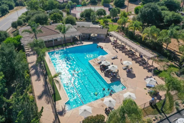 an aerial view of a house with a garden