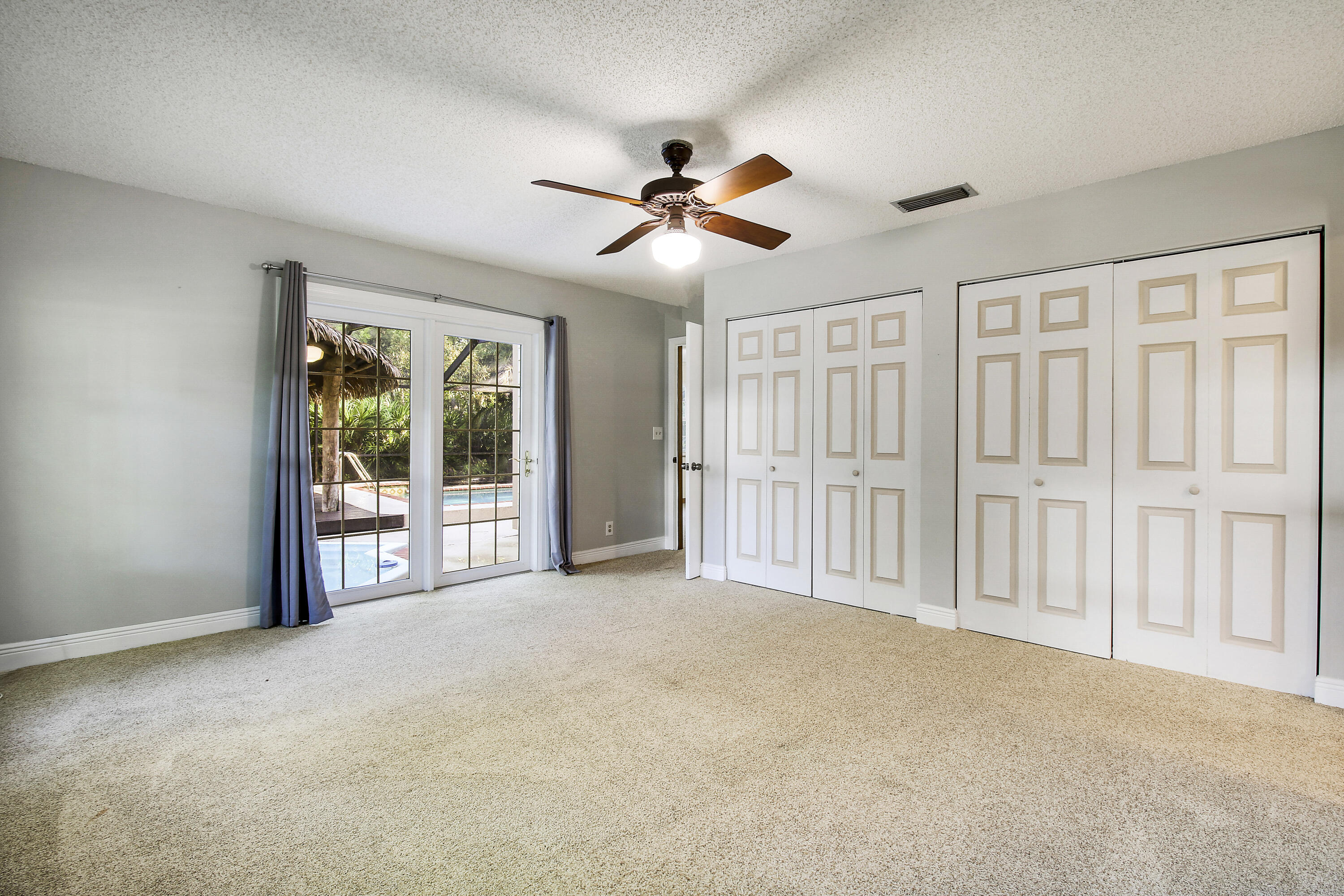 5673 Old Orange Road Jupiter, FL 33458 - Photo 27 of 49 Master Bedroom