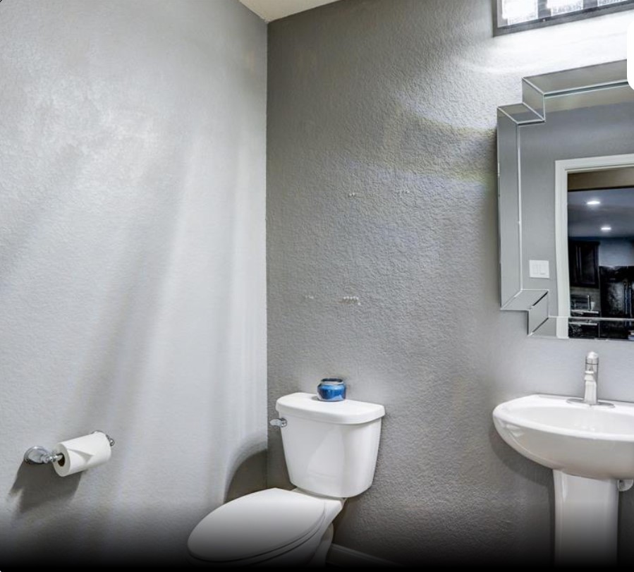 1 Rodeo Bend Drive Manvel, TX 77578 - Photo 11 of 22 a bathroom with a toilet and a sink