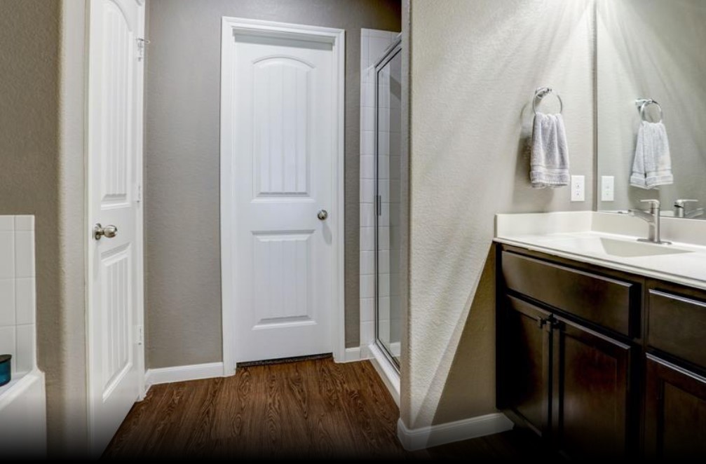 1 Rodeo Bend Drive Manvel, TX 77578 - Photo 13 of 22 a bathroom with a sink and a mirror