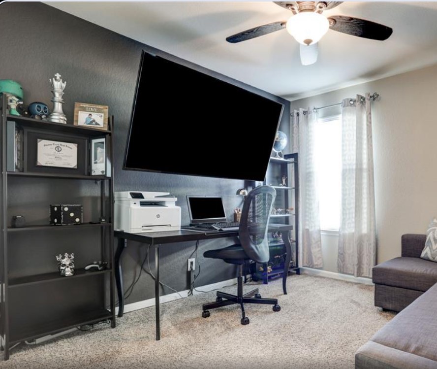 1 Rodeo Bend Drive Manvel, TX 77578 - Photo 15 of 22 a view of a livingroom with workspace and a window