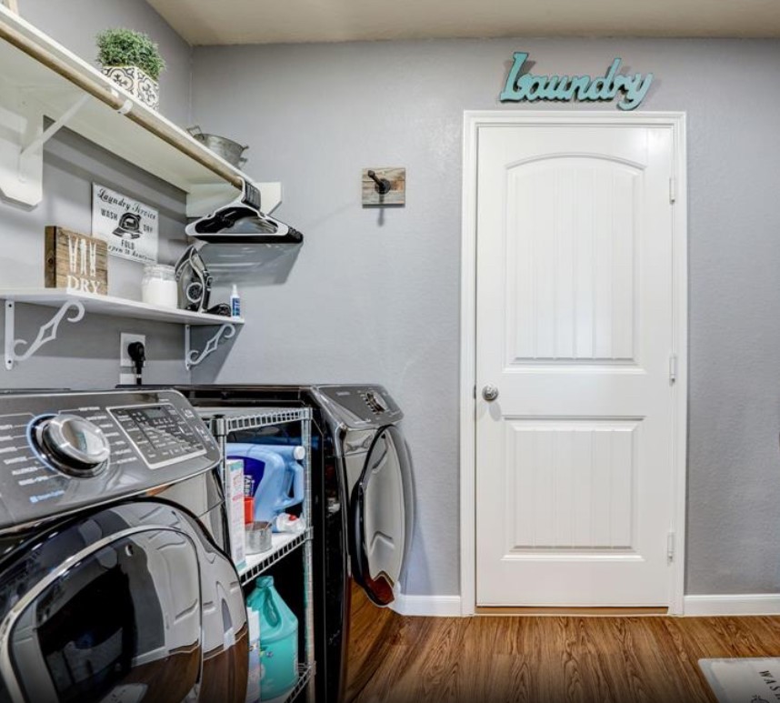 1 Rodeo Bend Drive Manvel, TX 77578 - Photo 20 of 22 a view of walk in closet with clothes and shoes