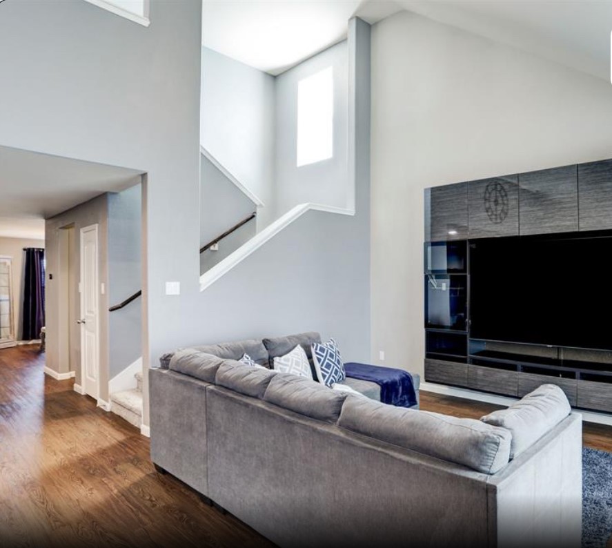 1 Rodeo Bend Drive Manvel, TX 77578 - Photo 9 of 22 a living room with furniture and a flat screen tv