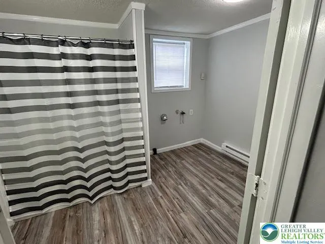 a bedroom with a bed and a table